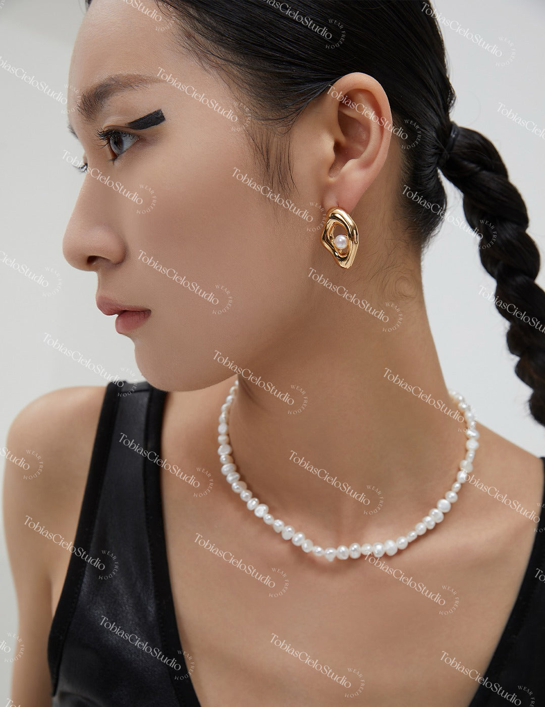 "Athena’s Tear" S925 Hollow Liquid Sterling Silver Earring with Pearl Detail