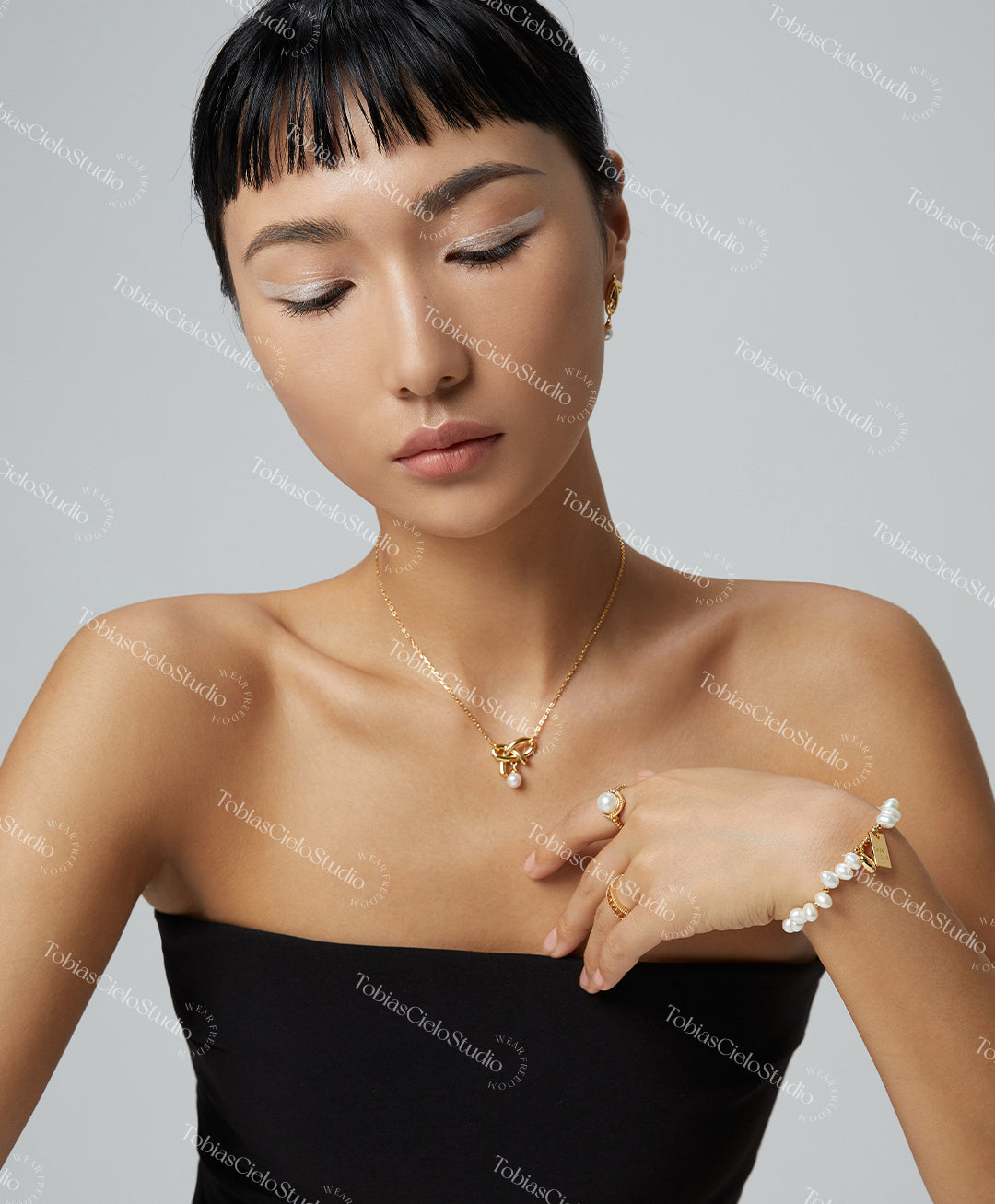 "Infinity" S925 Sterling Silver Necklace with Asymmetric Ribbon design